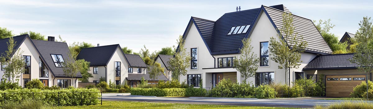 A row of new two-story houses with dark roofs.